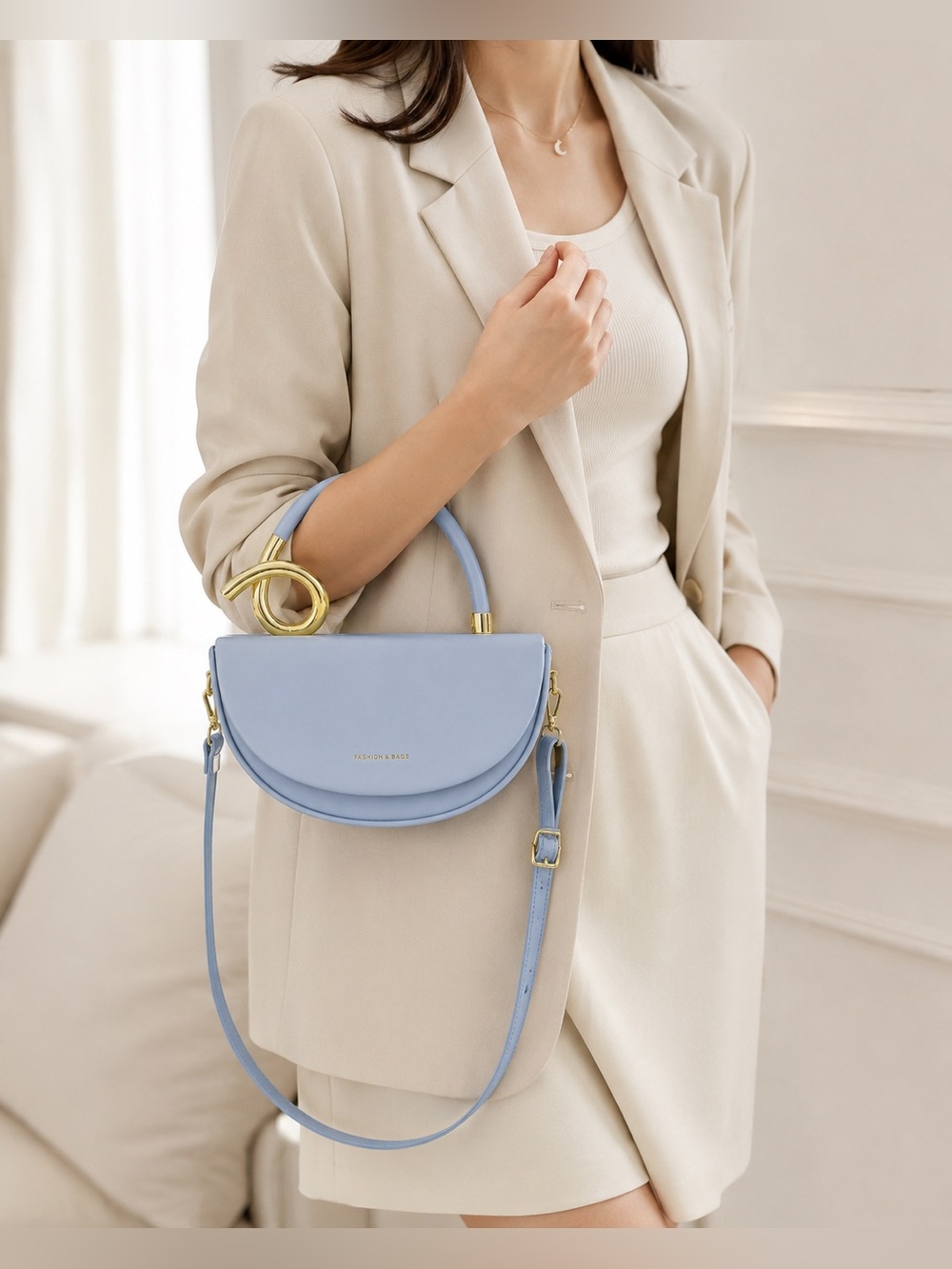 Baby Blue Half-Moon Crossbody Bag with Gold Sculptural Handle